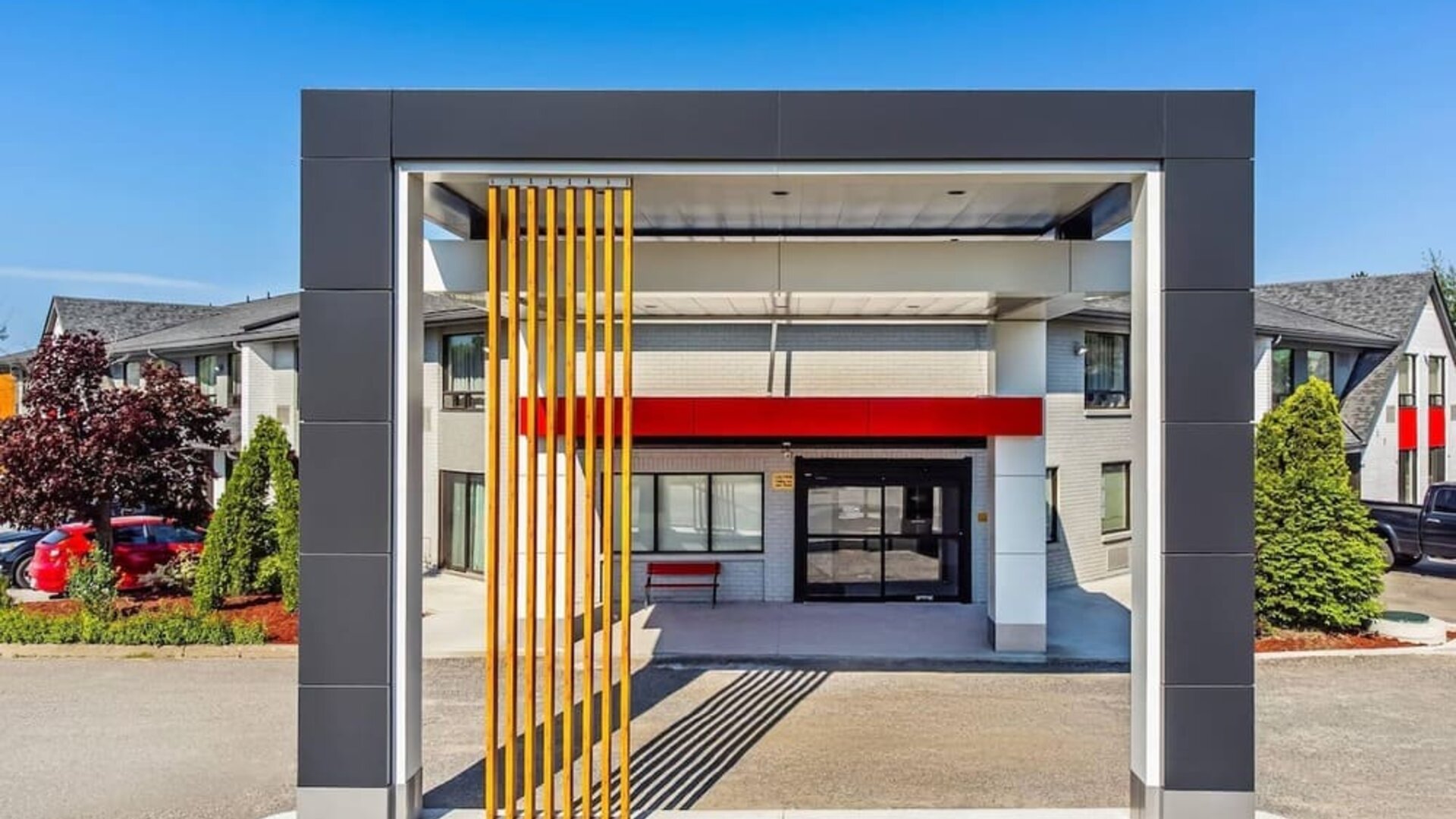 Modern hotel entrance with a covered porte cochère and convenient guest drop-off area at Comfort Inn Sudbury Regent Street.