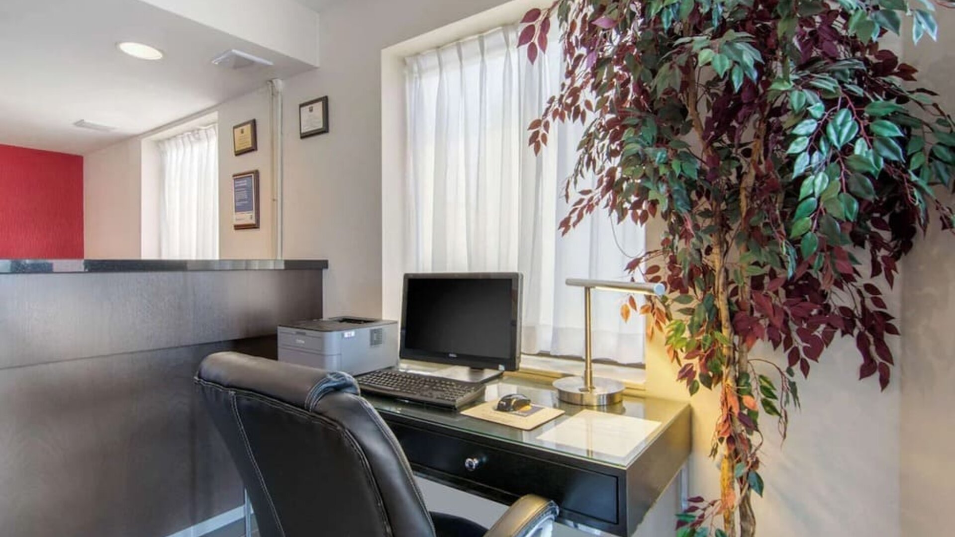Business center with a desktop computer, printer, and workspace available for guest use at Comfort Inn Sudbury Regent Street.