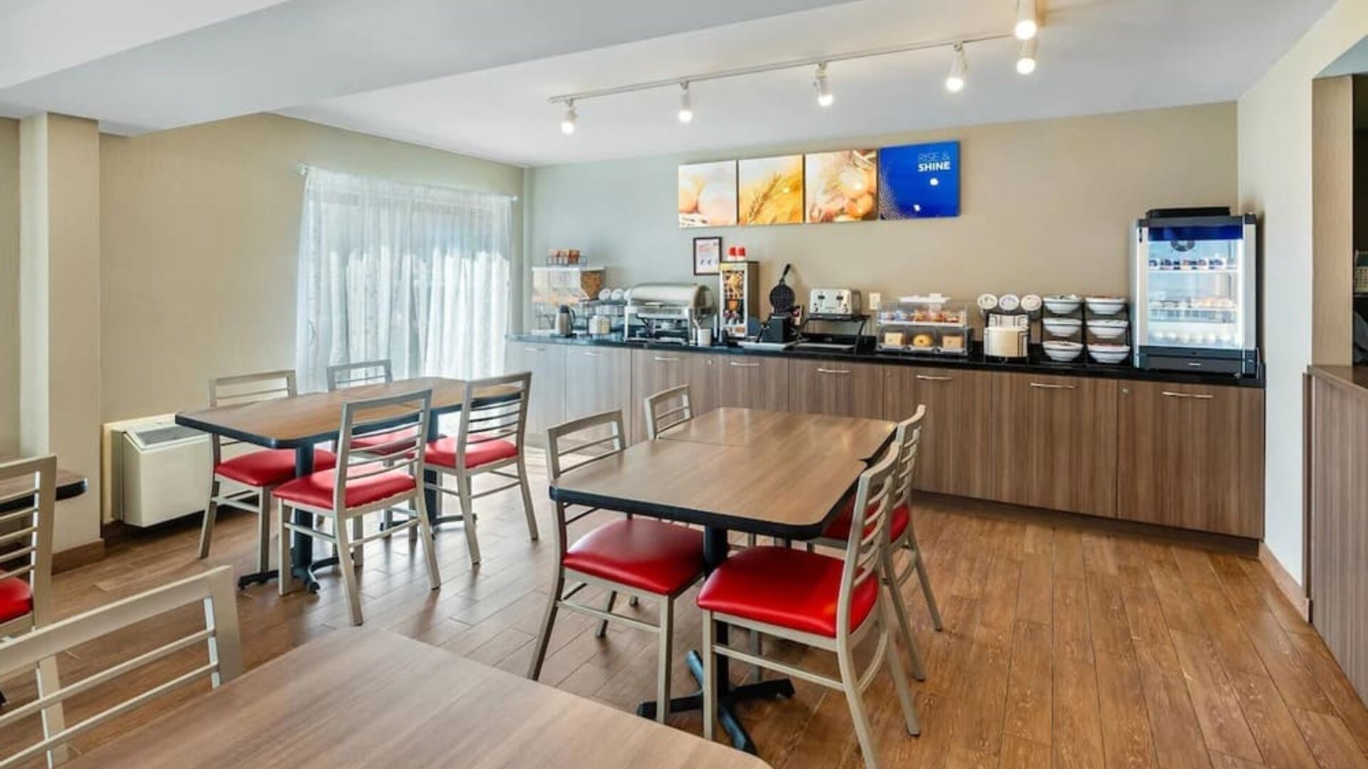 Bright breakfast area with comfortable seating and a complimentary hot breakfast served daily at Comfort Inn Sudbury Regent Street.