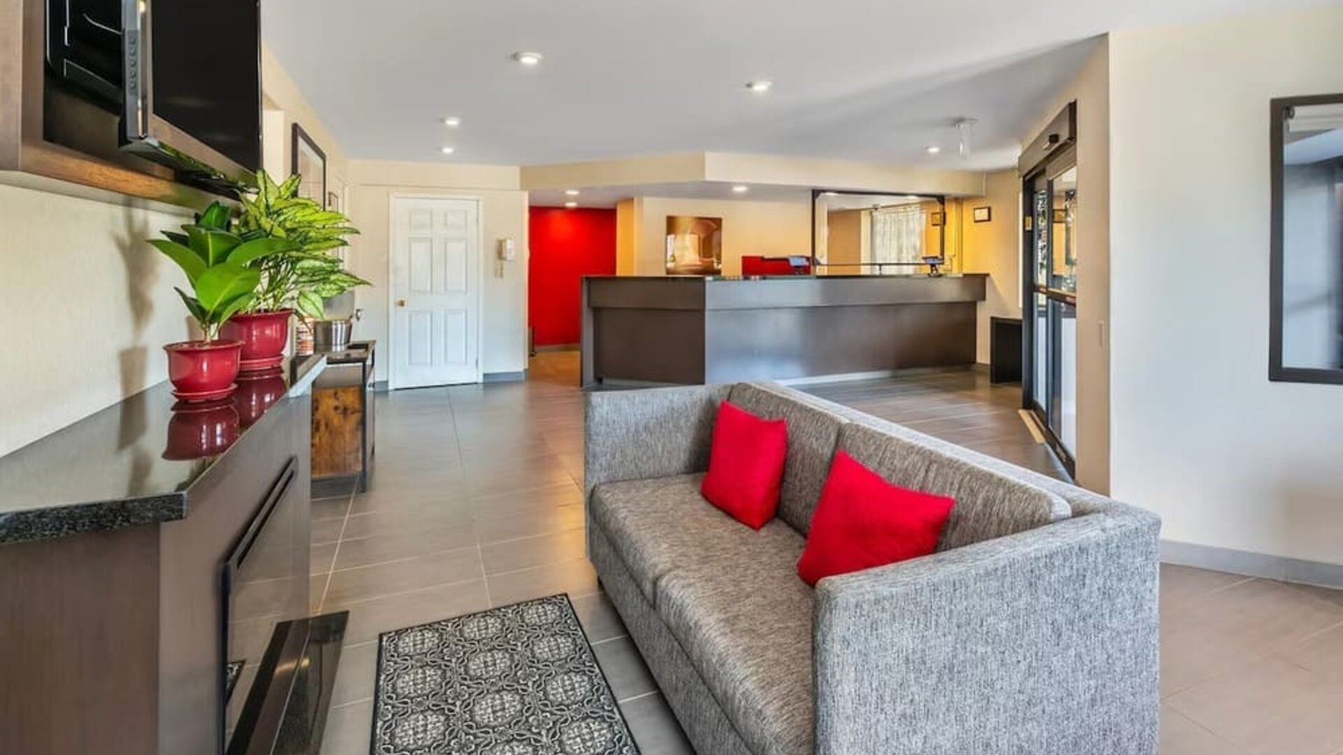 Hotel lobby with comfortable seating and convenient access to the front desk at Comfort Inn Sudbury Regent Street.