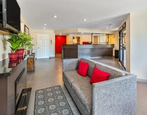 Hotel lobby with comfortable seating and convenient access to the front desk at Comfort Inn Sudbury Regent Street.