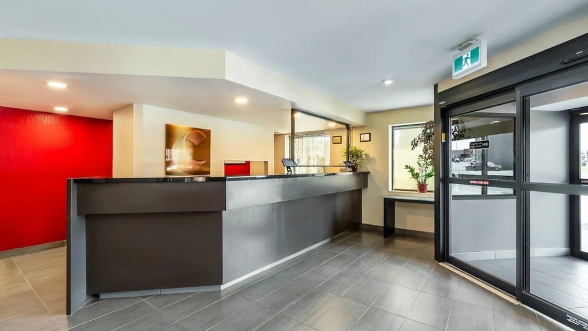 Front desk reception providing friendly guest service and convenient check-in at Comfort Inn Sudbury Regent Street.