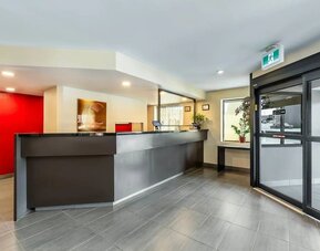 Front desk reception providing friendly guest service and convenient check-in at Comfort Inn Sudbury Regent Street.