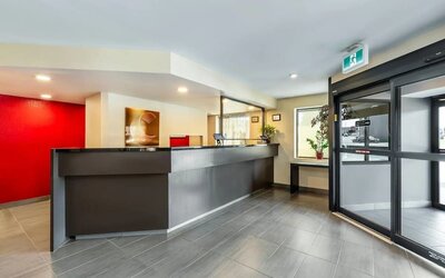 Front desk reception providing friendly guest service and convenient check-in at Comfort Inn Sudbury Regent Street.