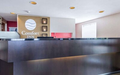Front desk and reception area welcoming guests at Comfort Inn Sudbury East.