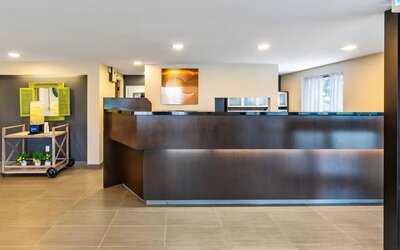 Modern reception desk welcoming guests to Comfort Inn Sudbury East.