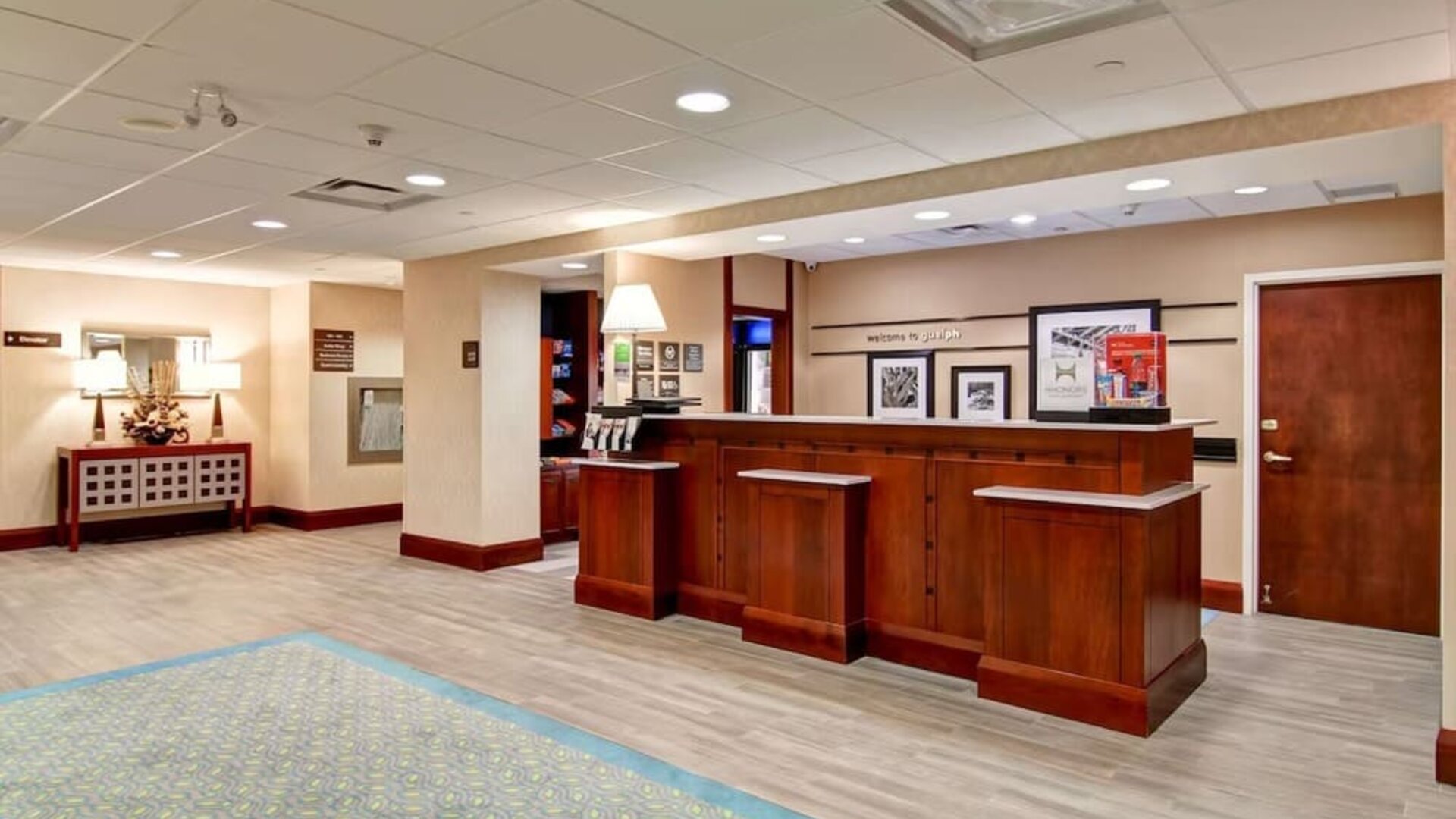 Hotel reception desk at Hampton Inn & Suites By Hilton Guelph.