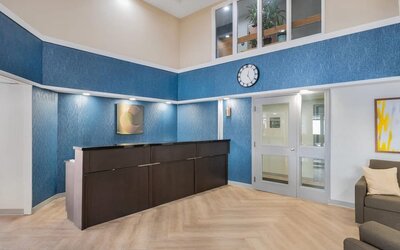Hotel reception area with modern lobby design at Comfort Inn Belleville.