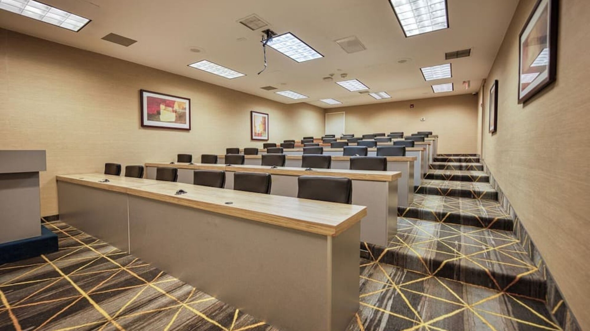 Ballroom event space with banquet seating at Amenida Residences.