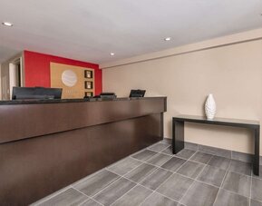 Hotel reception desk at Comfort Inn Ottawa East.