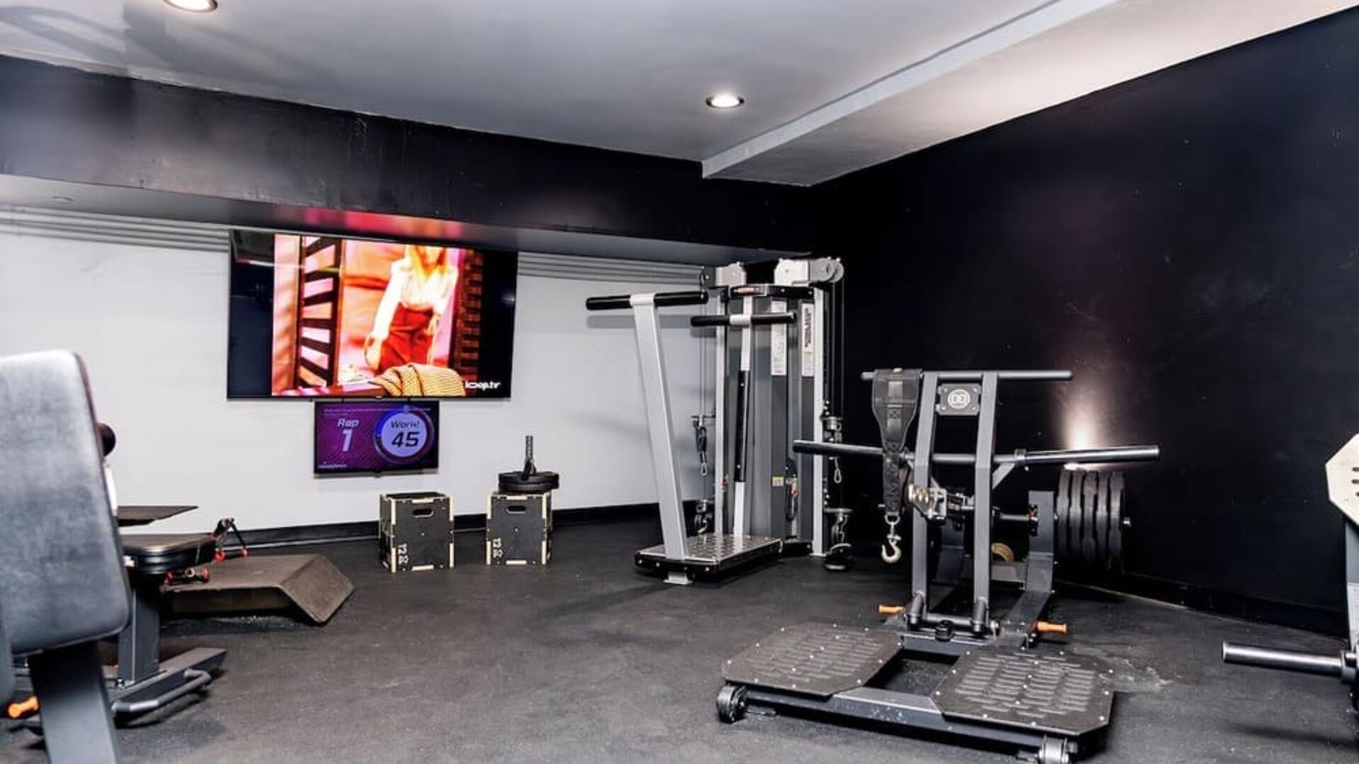 Fitness center with strength training equipment and free weights at Sherry Frontenac Oceanfront Hotel.