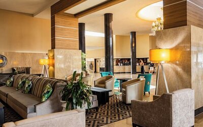 Hotel lobby lounge with comfortable seating at Sherry Frontenac Oceanfront Hotel.