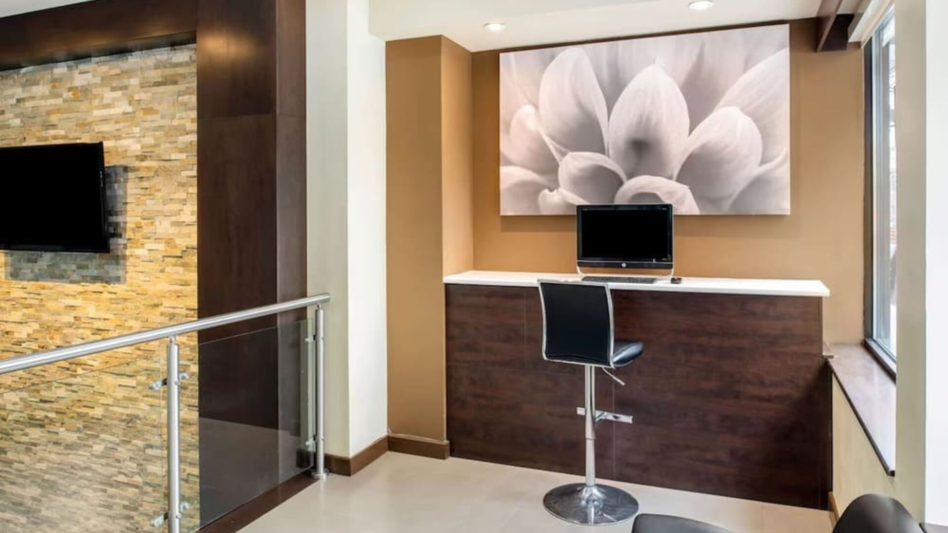Business center with computer workstation at La Quinta Inn & Suites By Wyndham Oshawa.