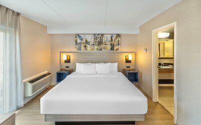 Guest room with a king bed at Comfort Inn Saskatoon.