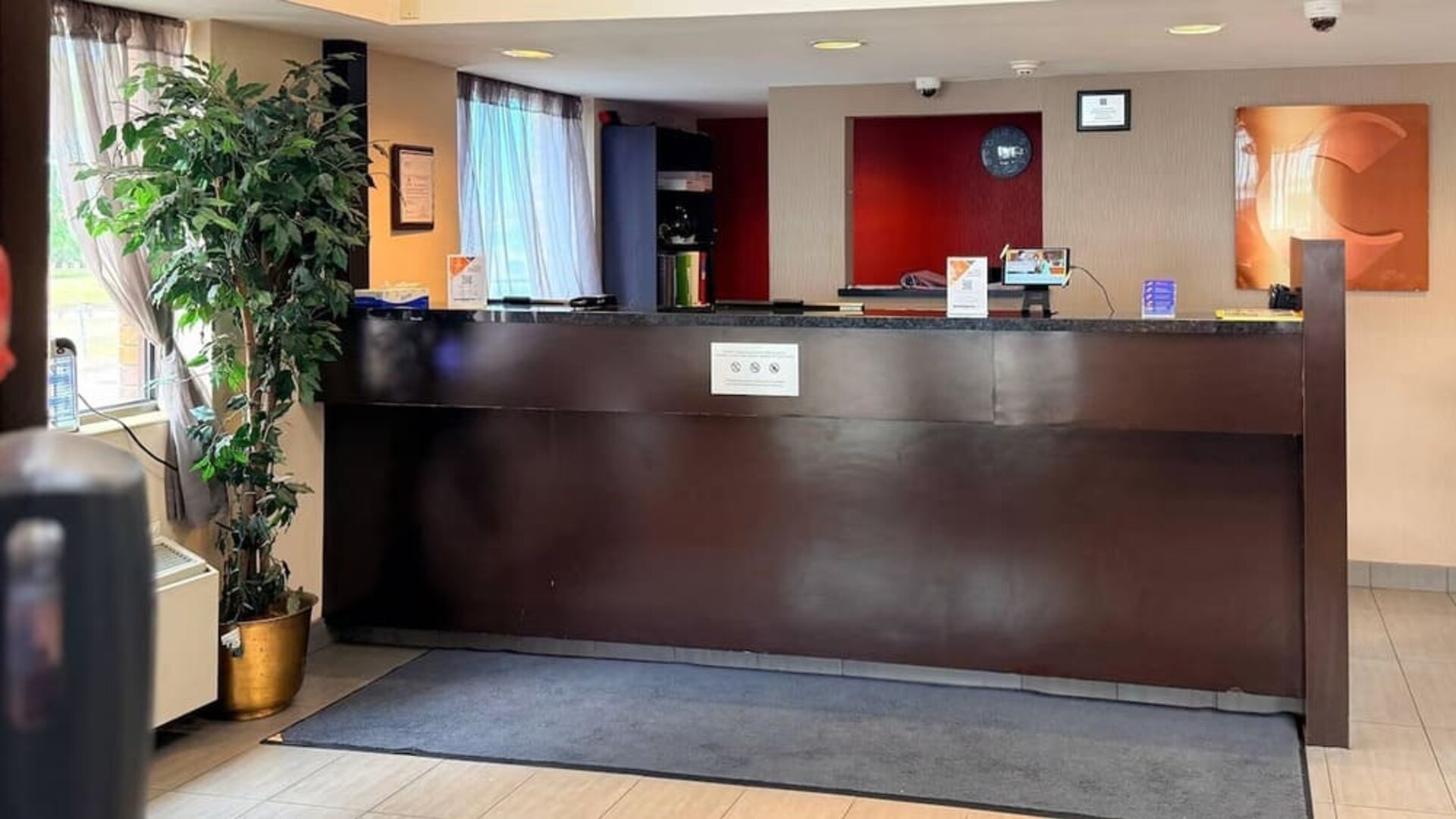 Hotel reception desk at Comfort Inn Saskatoon.