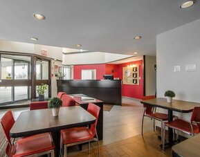 Hotel lobby with seating and reception desk at Comfort Inn Prince Albert.