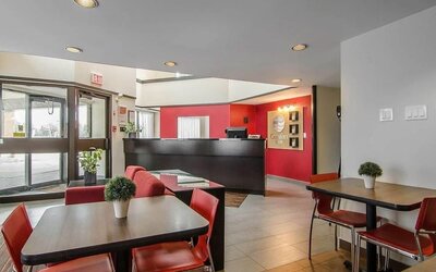 Hotel lobby with seating and reception desk at Comfort Inn Prince Albert.
