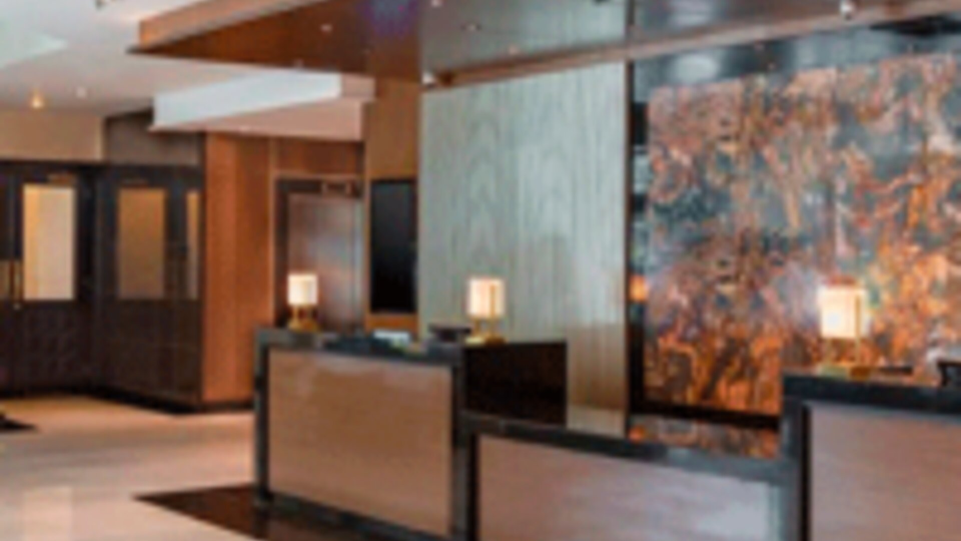 Spacious hotel lobby with contemporary reception area and elegant modern décor at Crowne Plaza Panama.
