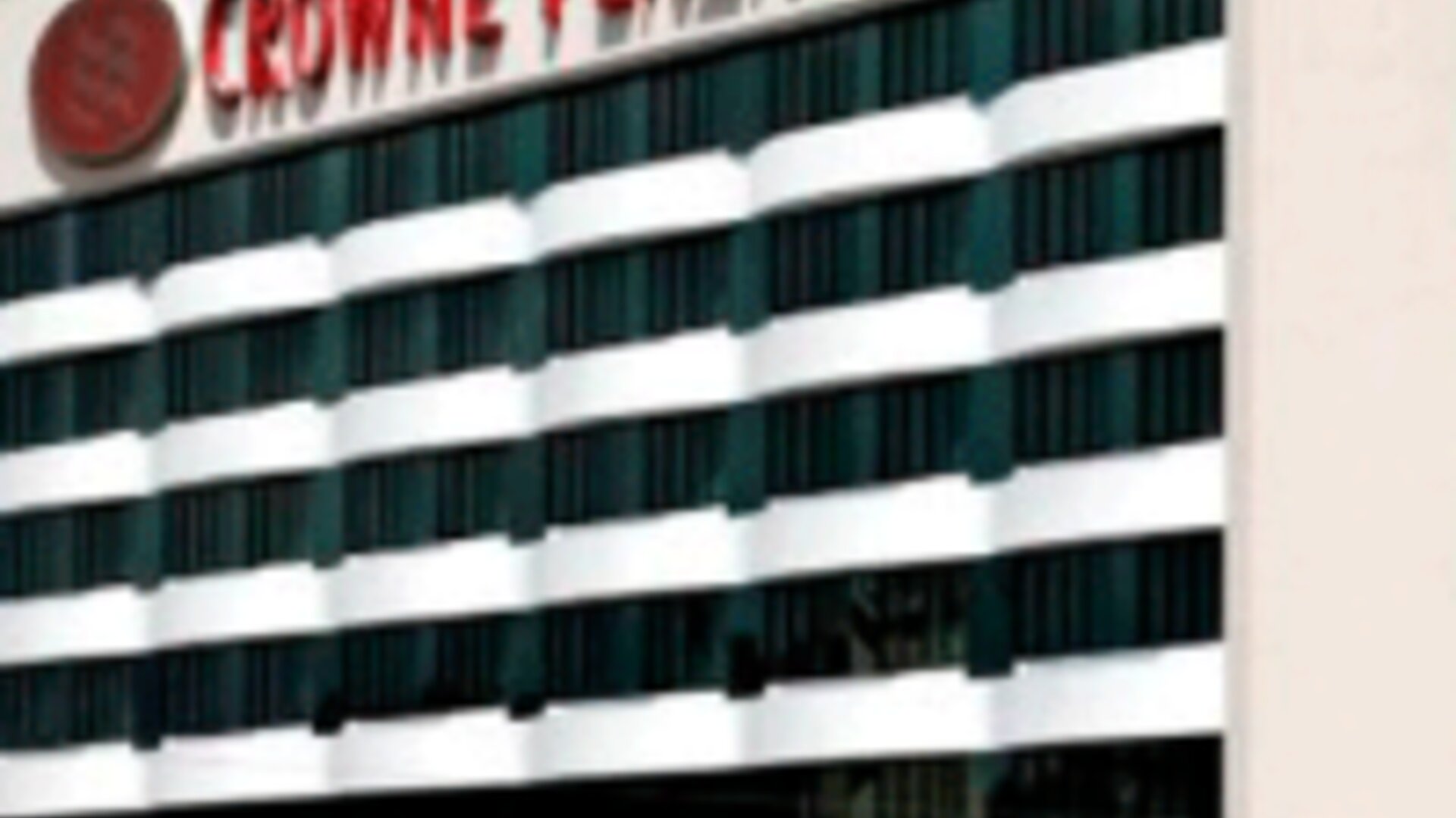 Exterior view of Crowne Plaza Panama showcasing the hotel's modern façade and signature branding.