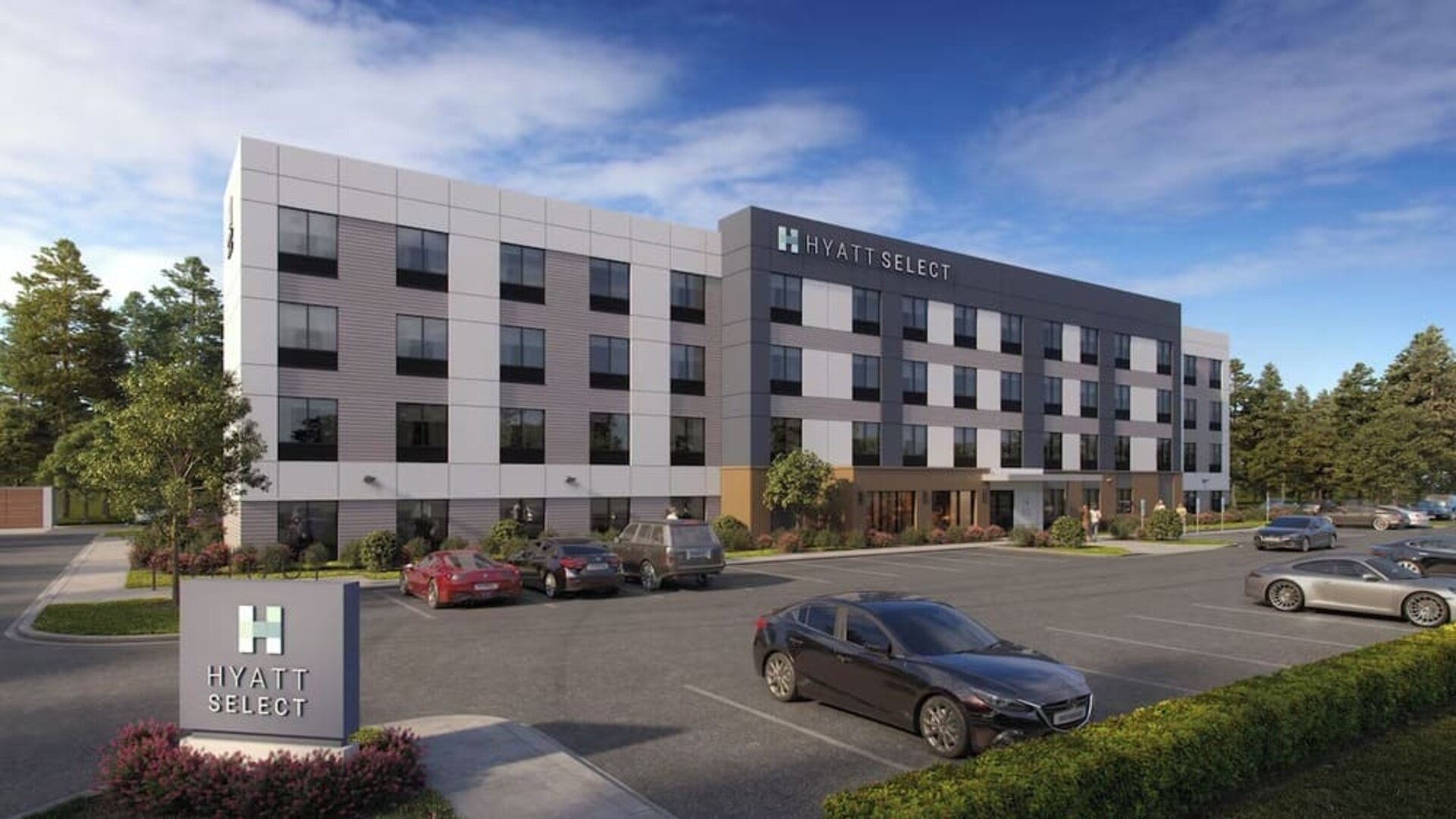 Exterior view of Hyatt Select Philadelphia Airport showcasing the contemporary hotel building, landscaped grounds and guest parking.