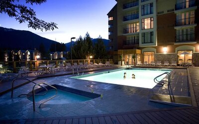 Romantic outdoor pool at Hilton Whistler Resort & Spa.