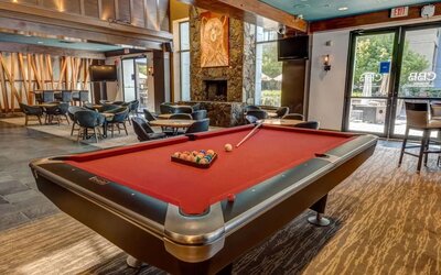 Game room and lounge area at Hilton Whistler Resort & Spa.