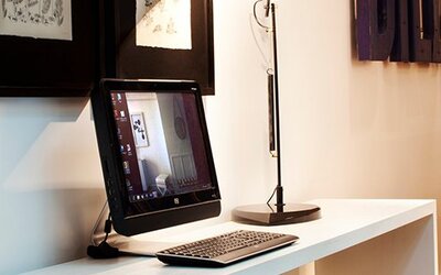Business center at Hotel Pulitzer Buenos Aires featuring a desktop computer and dedicated workstation.