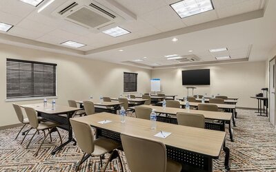Meeting facility featuring classroom-style seating, presentation equipment and a flexible event space for business gatherings at Candlewood Suites Meridian.