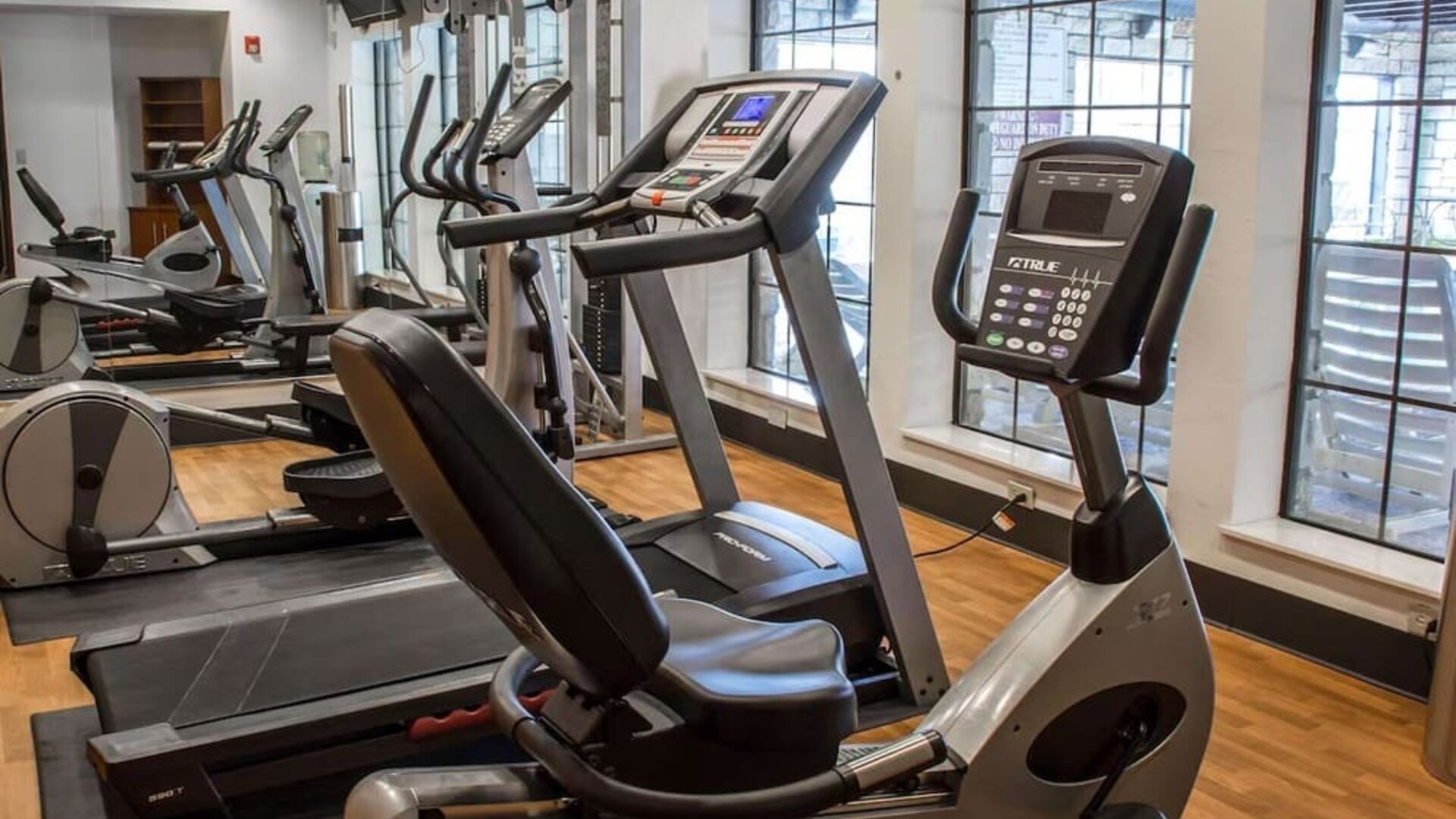 Fitness centre with treadmill, exercise bike, elliptical machines, and strength-training equipment at Comfort Suites San Antonio SeaWorld - Lackland AFB.