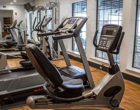 Fitness centre with treadmill, exercise bike, elliptical machines, and strength-training equipment at Comfort Suites San Antonio SeaWorld - Lackland AFB.