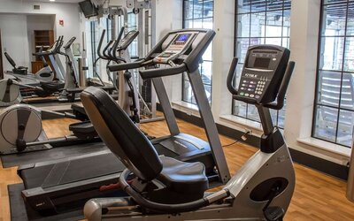 Fitness centre with treadmill, exercise bike, elliptical machines, and strength-training equipment at Comfort Suites San Antonio SeaWorld - Lackland AFB.