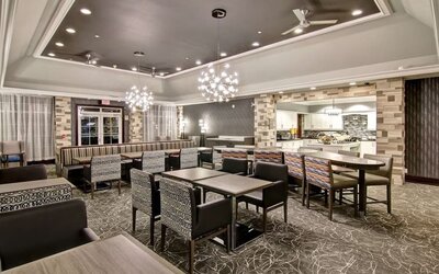 Dining area perfect for co-working at Homewood Suites By Hilton Burlington.