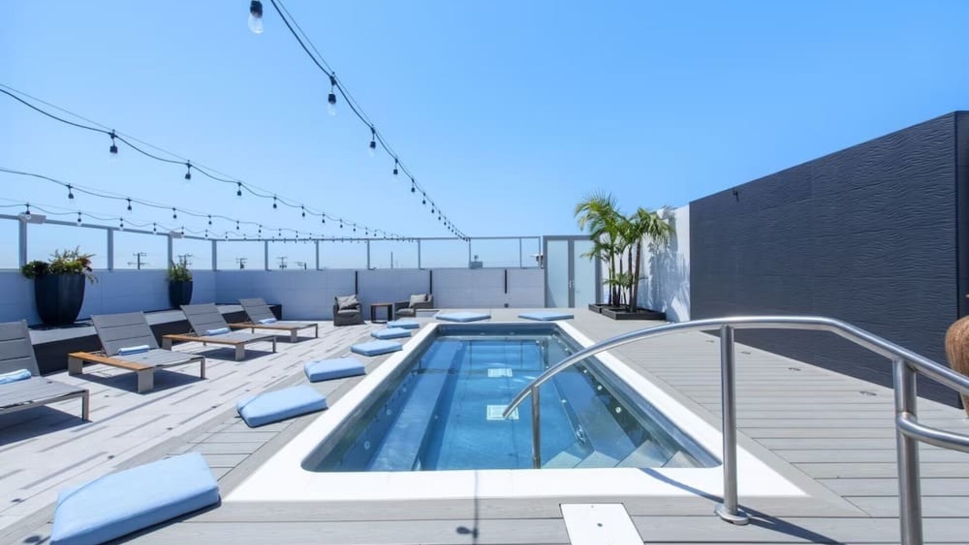 Refreshing outdoor pool and lounge chairs at Shade Hotel Manhattan Beach.