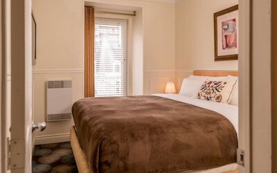 King bed day use room at Parc Suites Hotel.