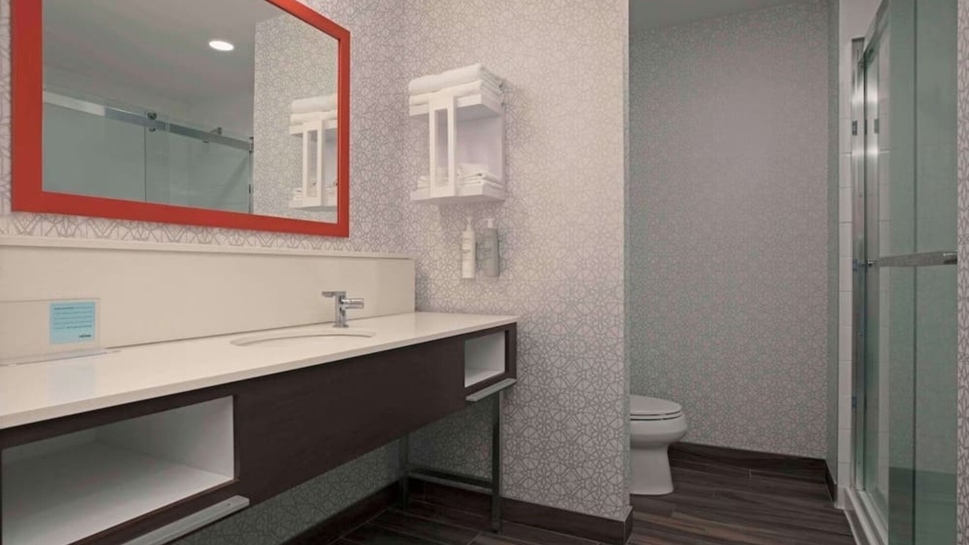 Private guest bathroom with toiletries at Hampton Inn By Hilton Port Hope.