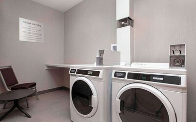 Guest laundry room at Hampton Inn By Hilton Port Hope.
