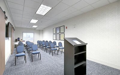Professional meeting room at Holiday Inn Express & Suites Airport-Calgary.