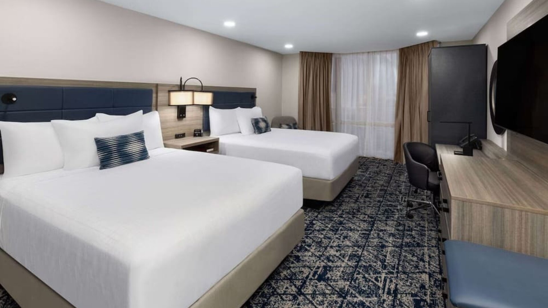 Queen beds at Wyndham DFW Airport.