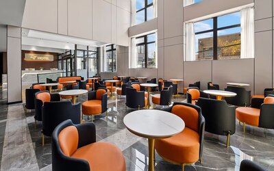 Dining and lounge area at Ly New York Hotel.