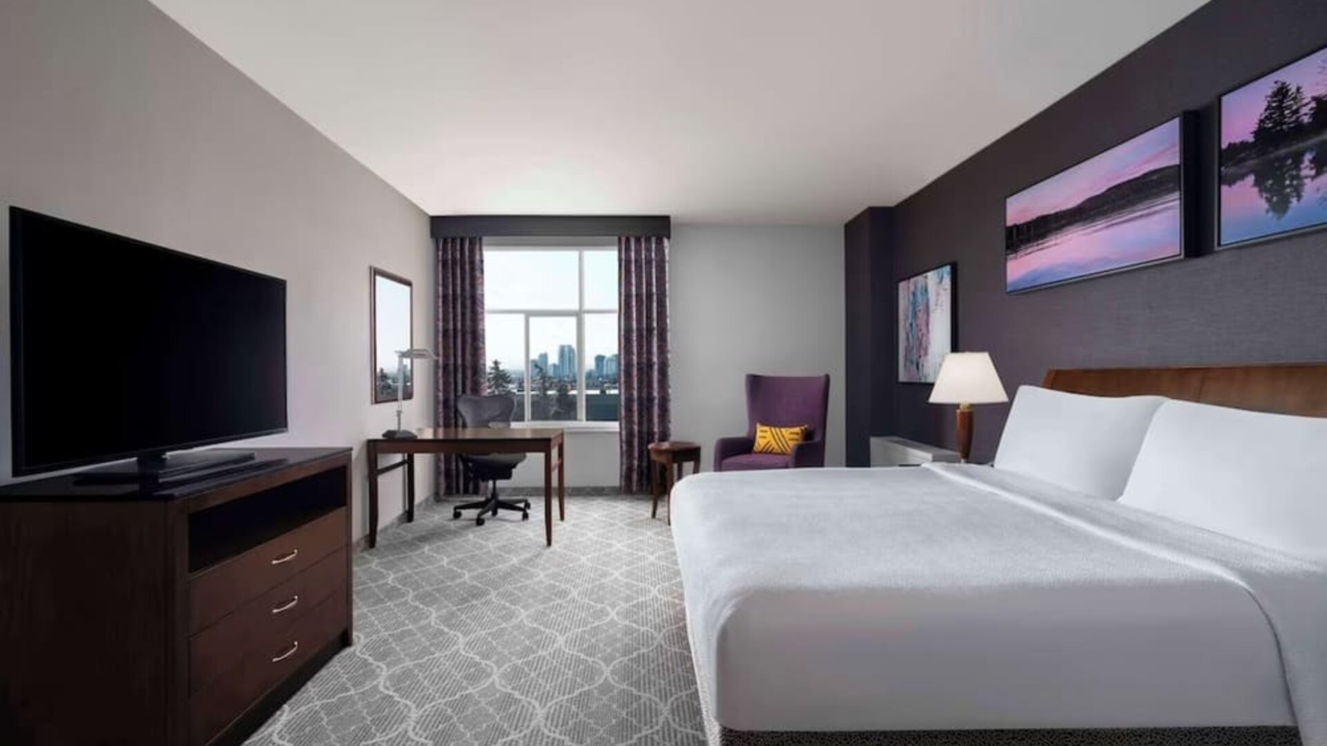 Bright and spacious day use room with King Bed, TV, work desk and private bathroom at Hilton Garden Inn Calgary Airport.