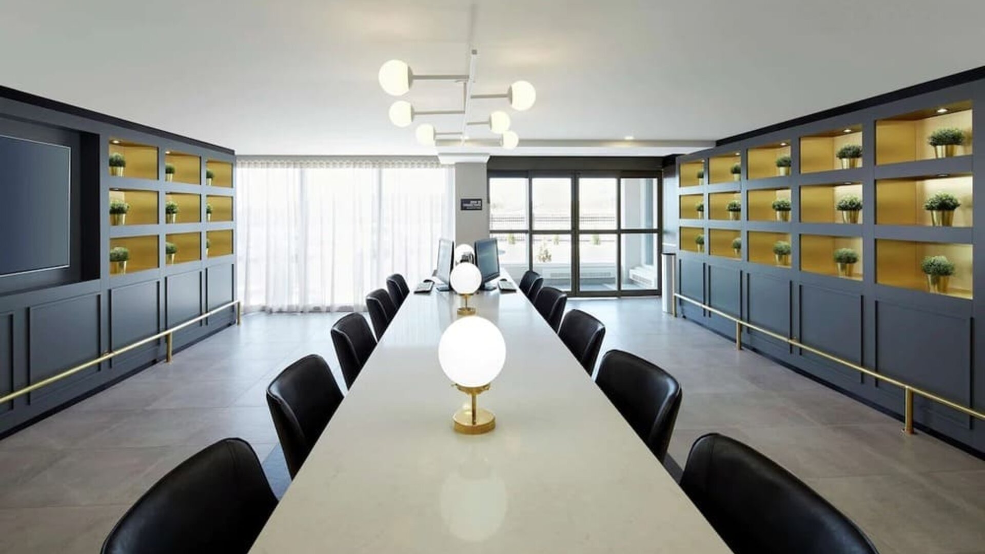 Bright and spacious business center with computers, printers and comfortable mobiliary at DoubleTree By Hilton Montreal Airport.