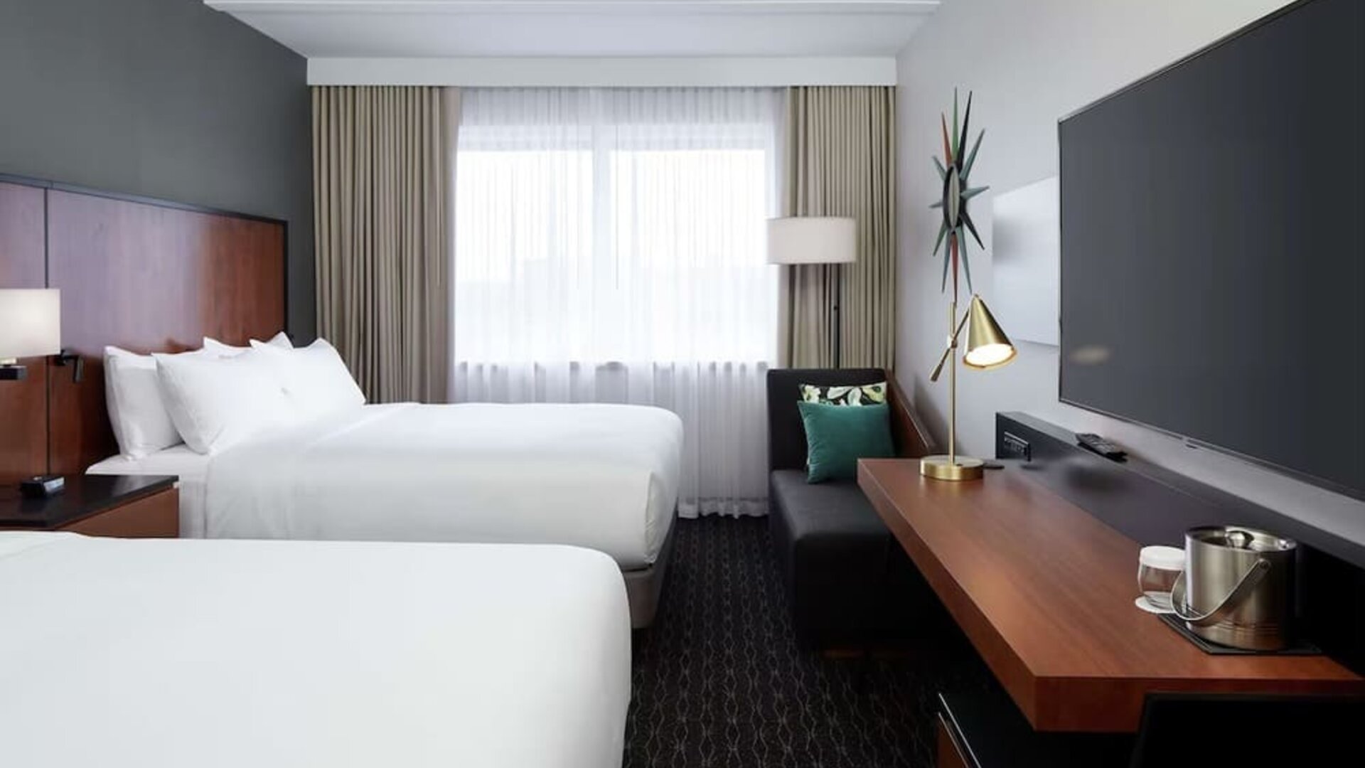 Day use Twin room with TV, work desk and private bathroom at DoubleTree By Hilton Montreal Airport.