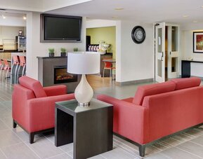 Lobby and coworking lounge at Comfort Inn Sudbury East.