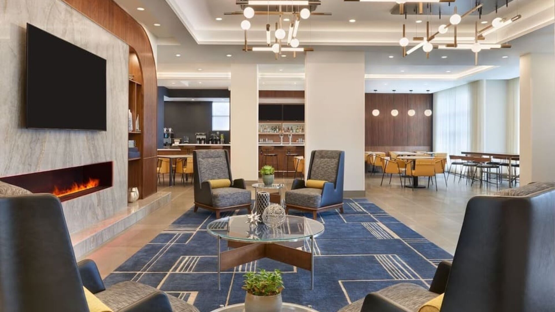 Lobby and coworking lounge at Courtyard By Marriott Kitchener.