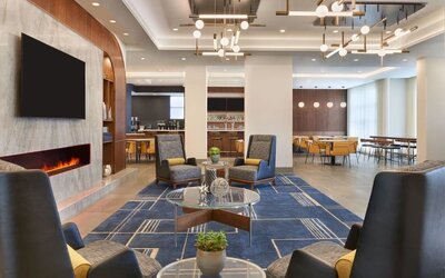 Lobby and coworking lounge at Courtyard By Marriott Kitchener.