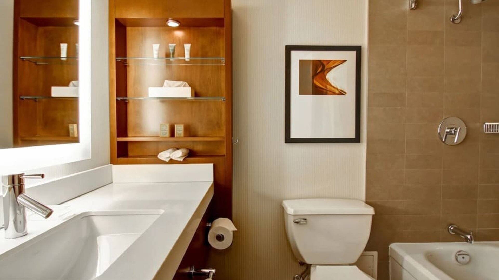 Private guest bathroom with shower and tub at Hilton Mississauga Meadowvale.