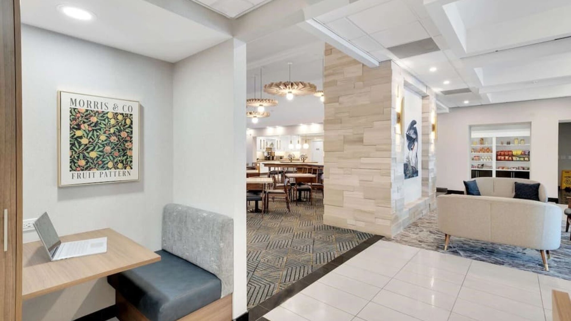 Lobby lounge area and workspace perfect for co-working at Homewood Suites By Hilton Toronto-Markham.