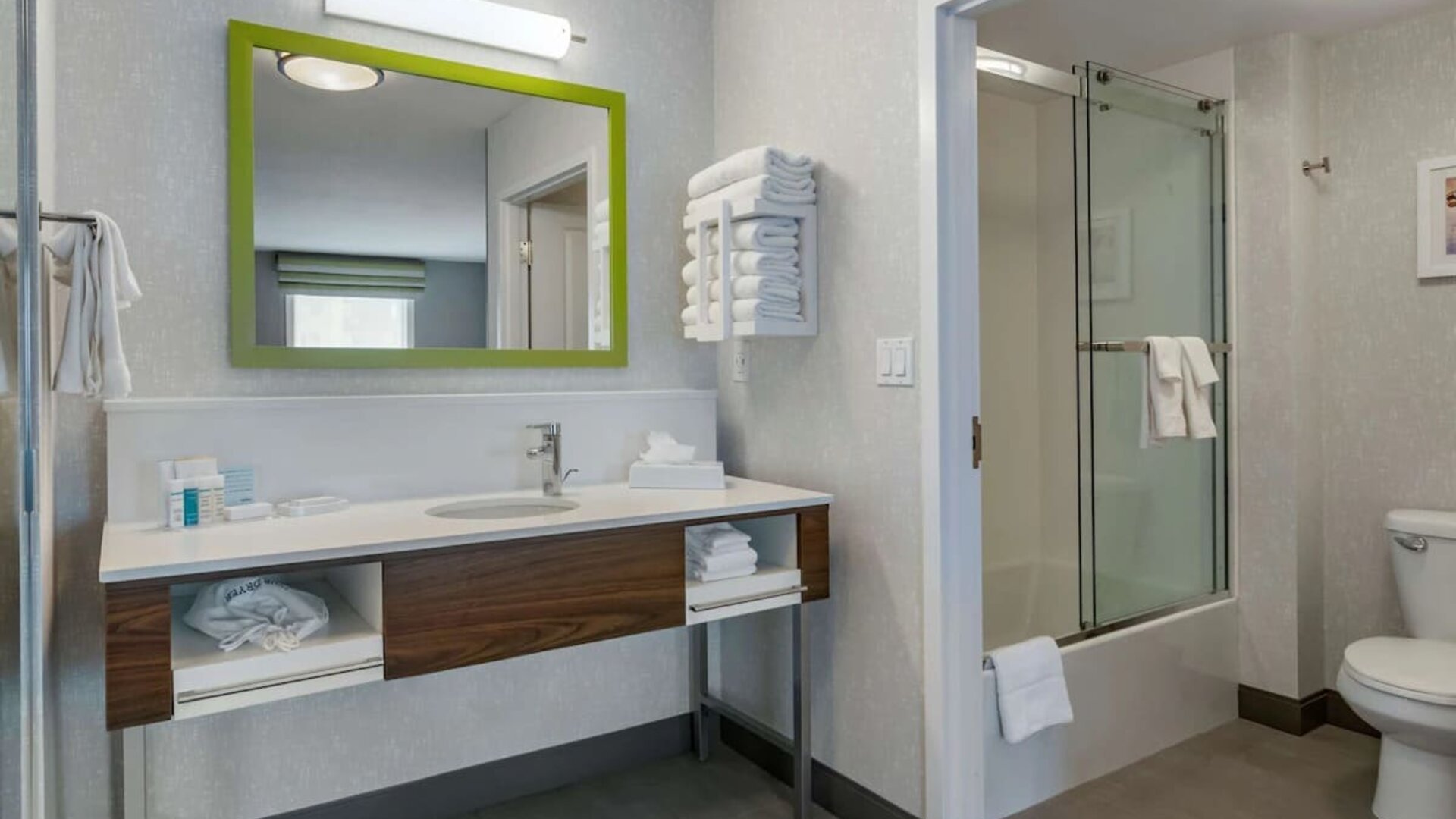 Private bathroom with shower and free toiletries at Hampton Inn & Suites By Hilton Edmonton/West.