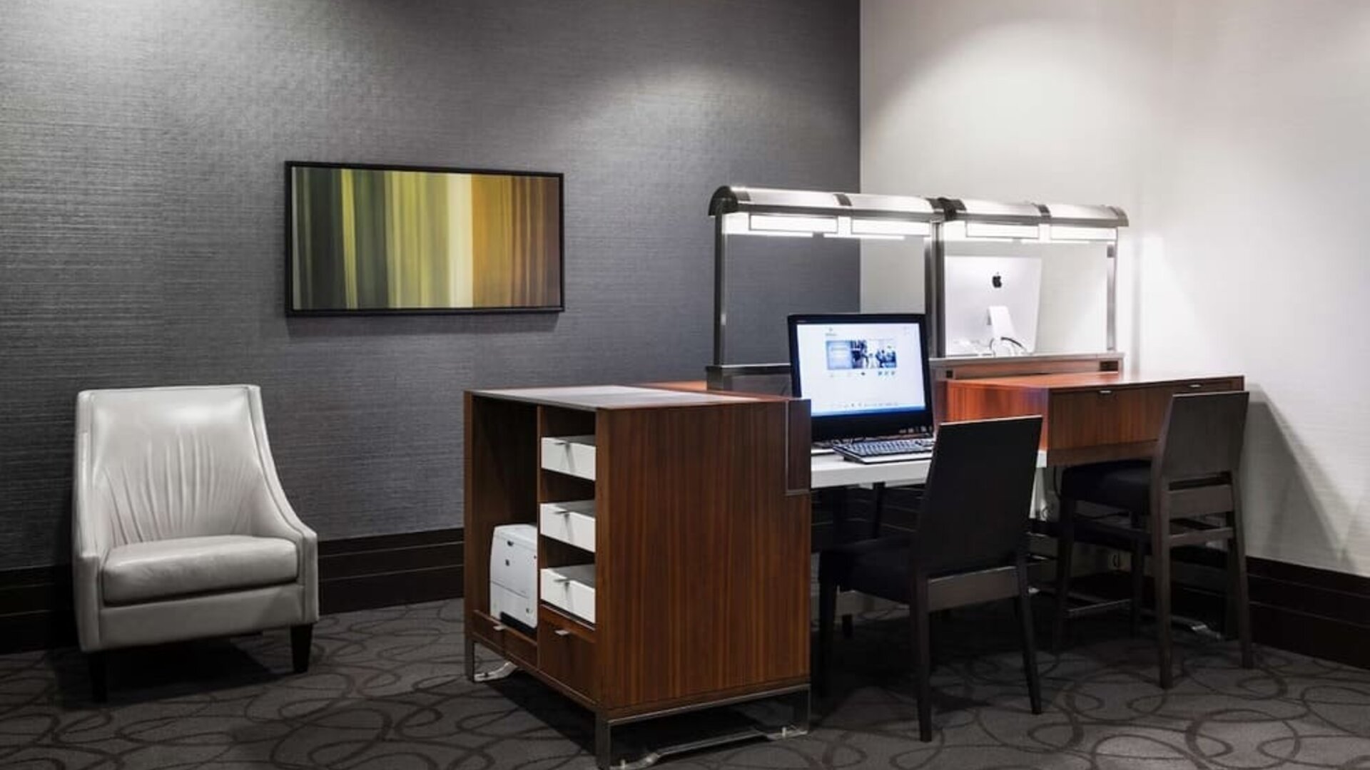 Business center with computer and printer at Hilton Winnipeg Airport Suites.