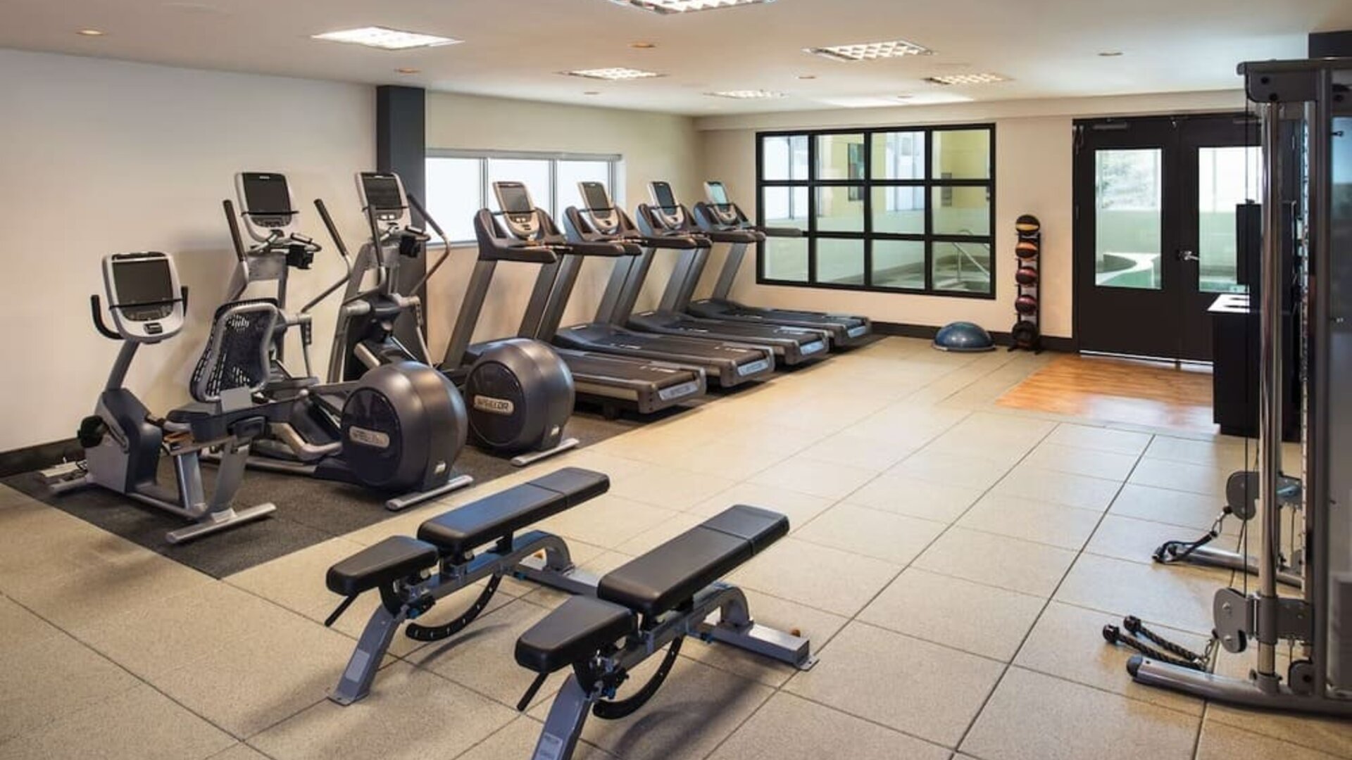Fully equipped fitness center at Hilton Winnipeg Airport Suites.